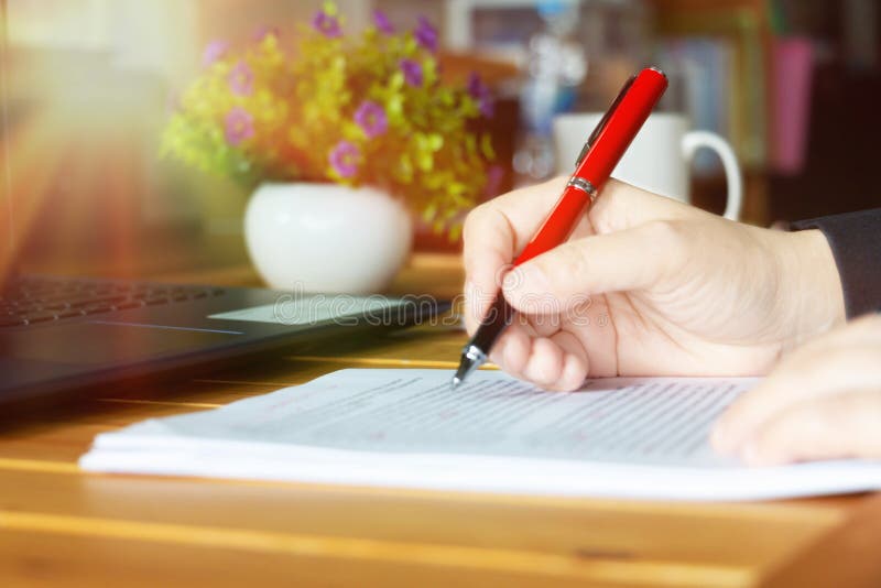 Hand working on editing blur text on desk in office. Computer editing stock images, royalty-free photos and pictures