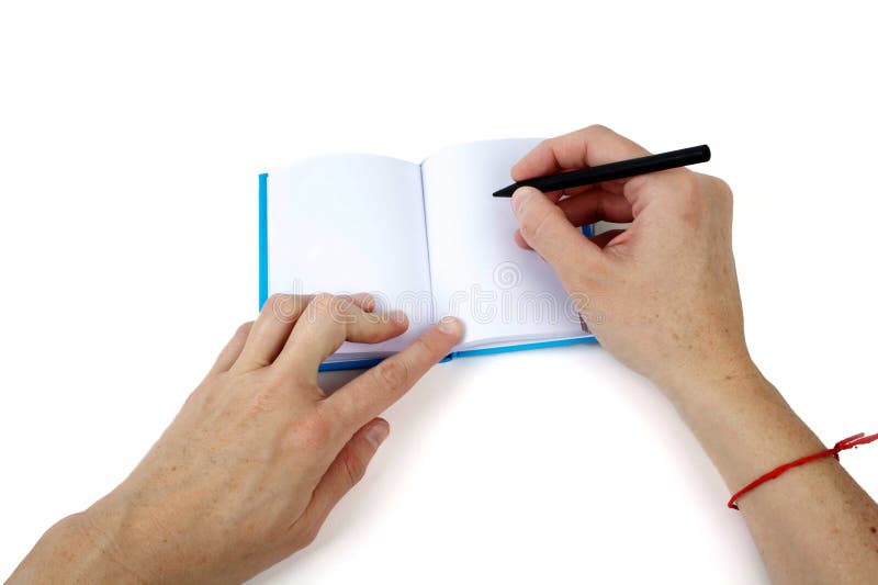 Hand writing on a small notebook