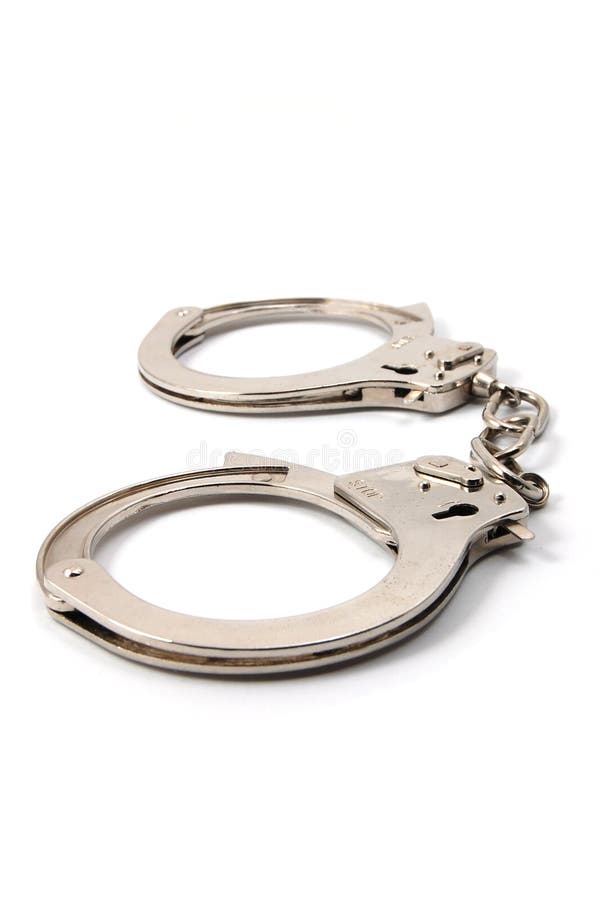 Police handcuffs isolated on a white background. Police handcuffs isolated on a white background
