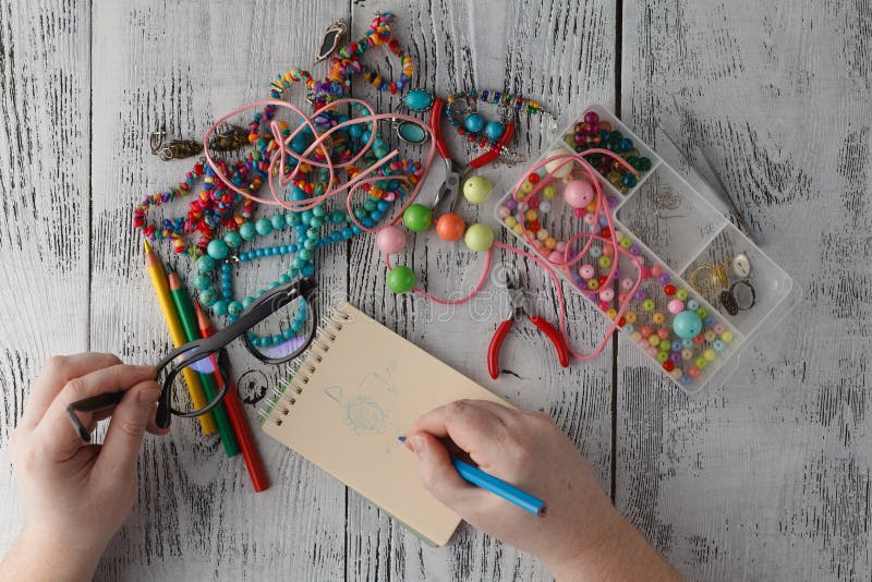 Handcraft beads on table stock photo. Image of decorative 88440048