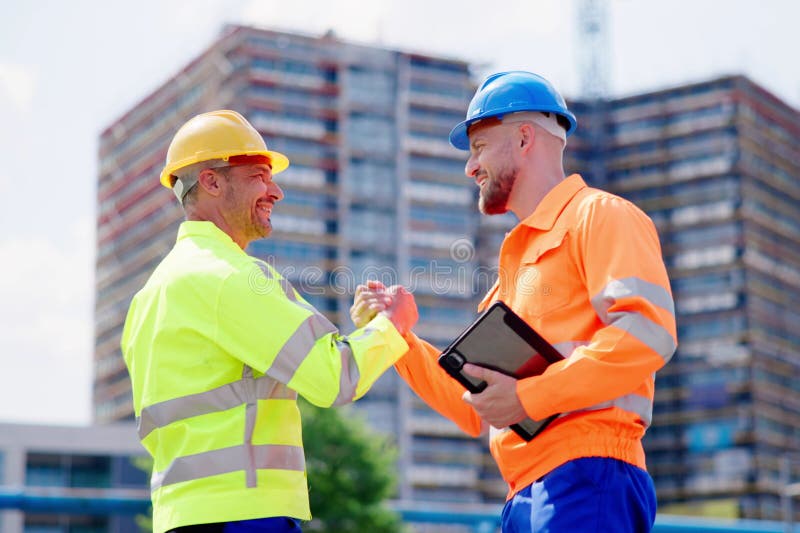 Handdruk van een bouwmedewerker stock foto's