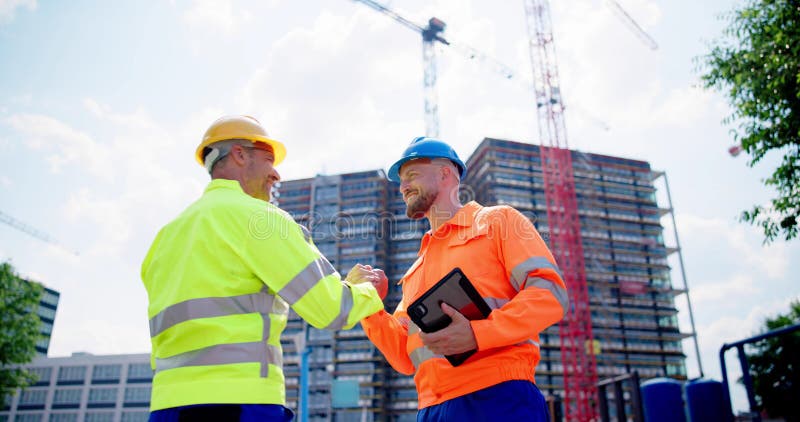 Handdruk van een bouwmedewerker stock foto's
