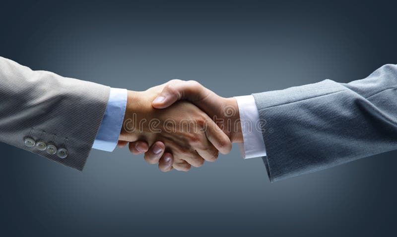 Handdruk - de holding van de Hand stock afbeelding Handdruk - de holding van de Hand stock afbeelding