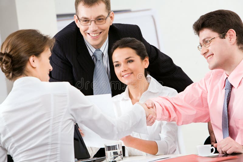 Handdruk op kantoor stock foto