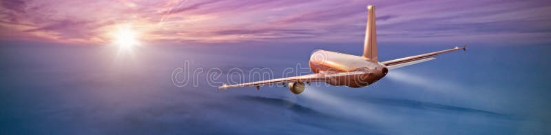 Commercial airplane flying above clouds in dramatic sunset light. High resolution of image. Fast Travel and transportation concept. Commercial airplane flying above clouds in dramatic sunset light. High resolution of image. Fast Travel and transportation concept