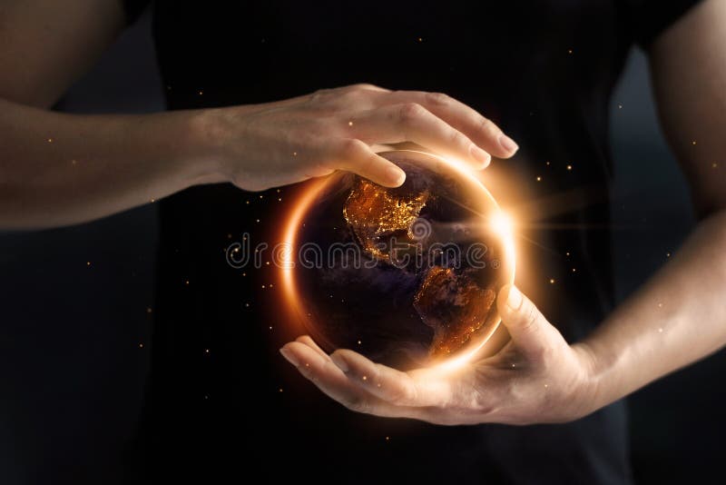 Handen die globaal tonend het wereld` s energieverbruik houden royalty-vrije stock foto Handen die globaal tonend het wereld` s energieverbruik houden royalty-vrije stock foto