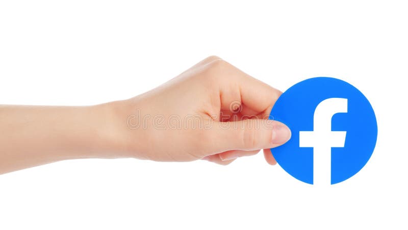 Handen rymmer den nya Facebook logoen stock illustrationer Handen rymmer den nya Facebook logoen stock illustrationer