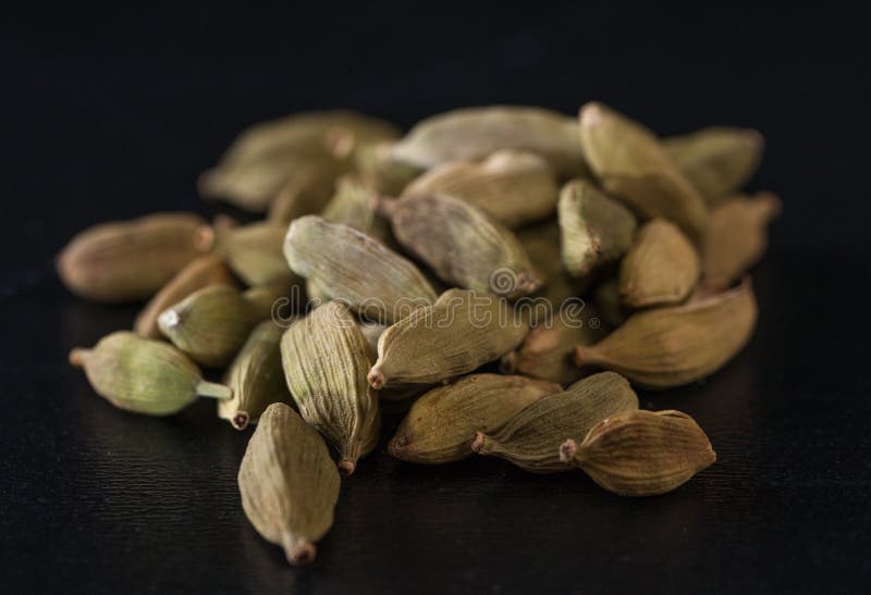 A Handful of Cardamon Seeds on a Black Table Stock Image Image of