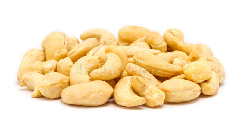 Handful of raw cashew seeds Anacardium occidentale without shell, close up, isolated on white background