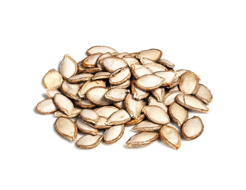 Handful of unhusked Pumpkin seeds closeup on white background