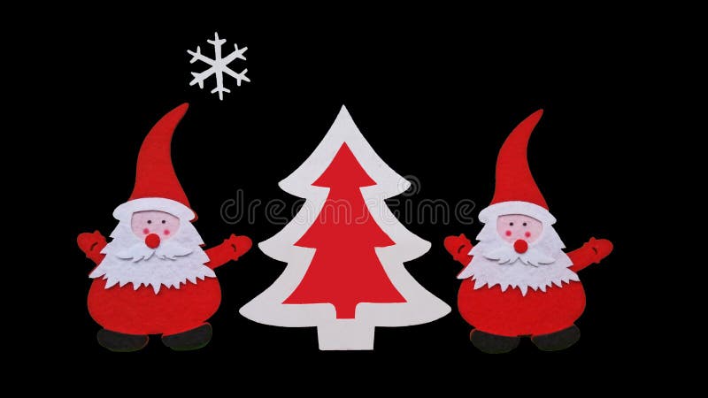 Handgjord julsammansättning Teckning av det Santa Claus och för nytt år trädet som göras av limmade stycken av filt och kryssfane