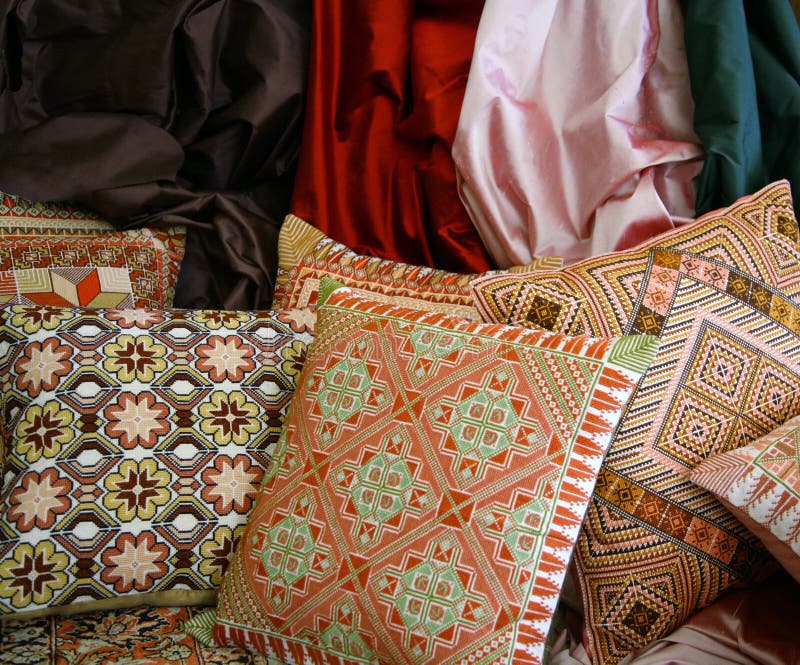 Handmade Arabian embroidered throw pillows and silk cloth. Handmade Arabian embroidered throw pillows and silk cloth.