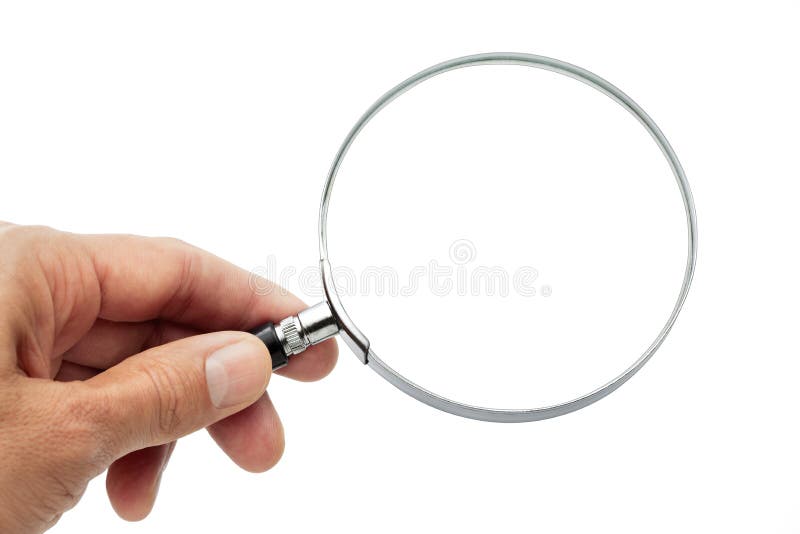 A hand holding a magnifying glass isolated on a white background. A hand holding a magnifying glass isolated on a white background