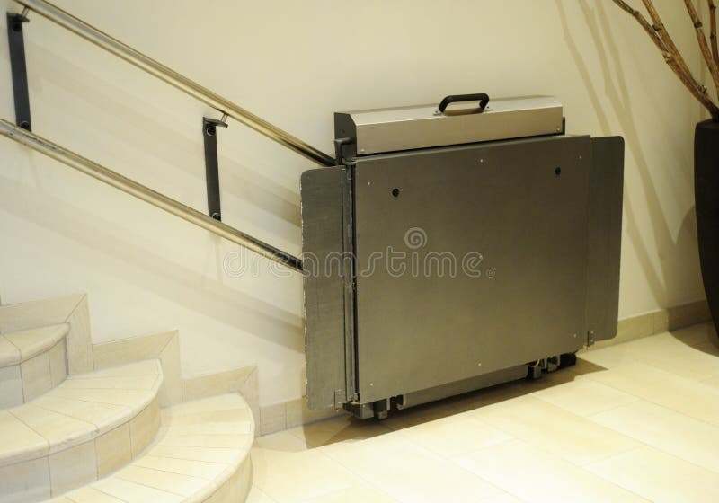 Handicap lift, elevator for invalid wheelchair stock photo