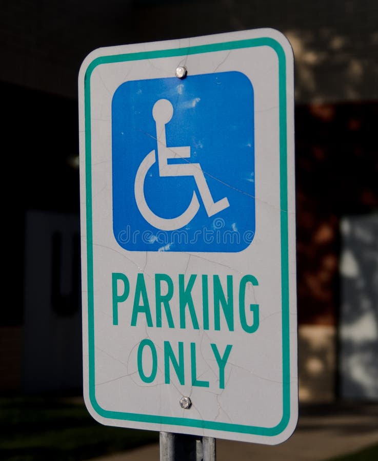 Sign designating parking spot for the disabled. Sign designating parking spot for the disabled