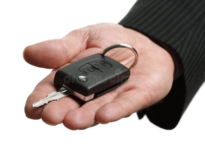 Handing over a car key stock photography