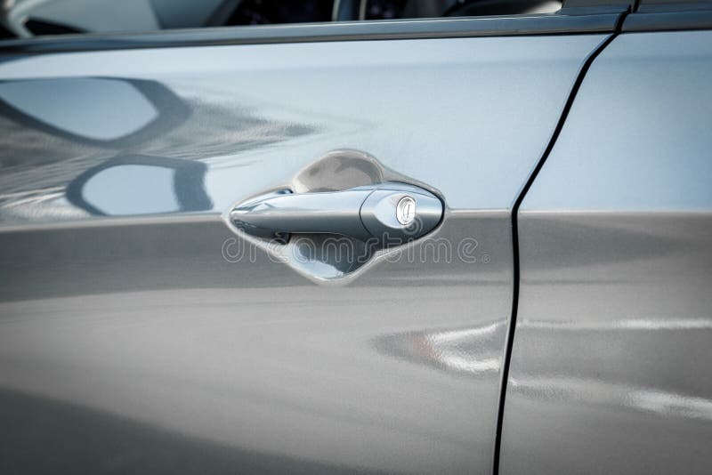 Handle with Lock of a Silver Car Door, Closeup Stock Image Image of
