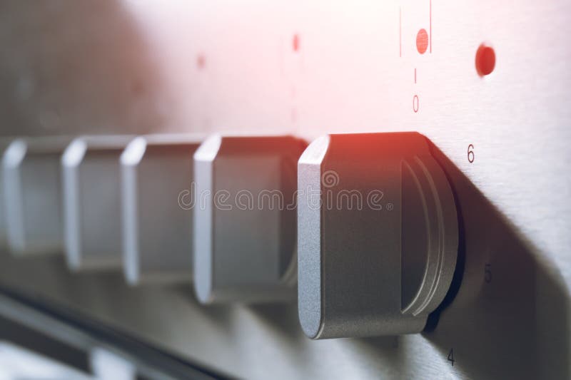 Old Gas Stove Handles and Front Panel in Kitchen, Danger, Risk Hazard