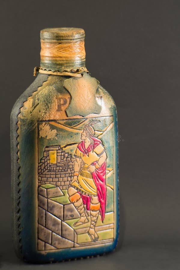 handmade antique bottle, filled with Peruvian pisco royalty free stock photos handmade antique bottle, filled with Peruvian pisco royalty free stock photos