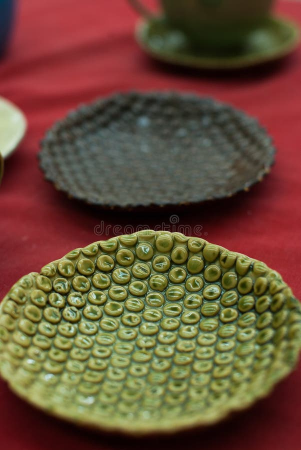 Handmade ceramic plates stock image. Image of decorated 34890357