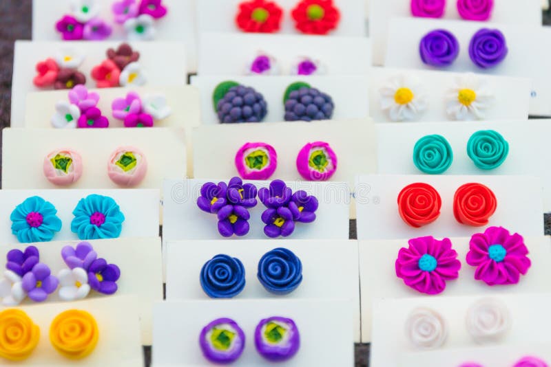 Handmade colorful earrings stock photos