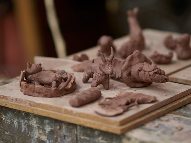 Handmade craft - medieval clay figures stock photos Handmade craft - medieval clay figures stock photos