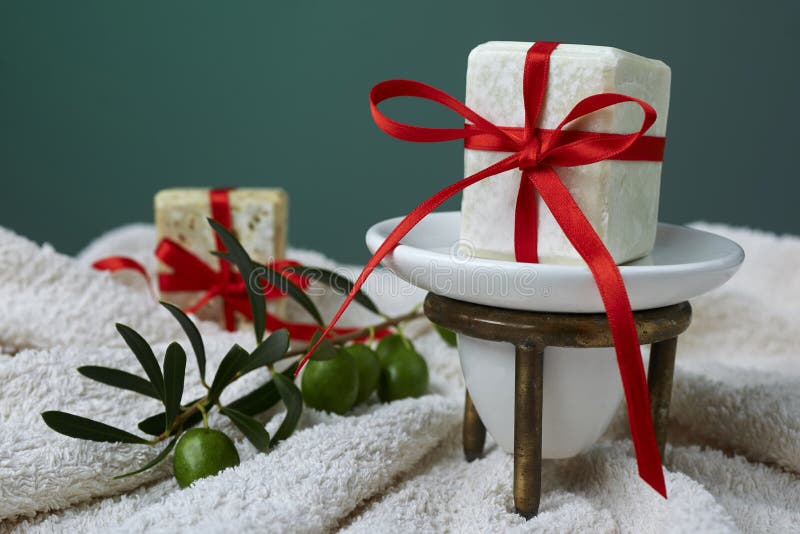 Handmade Olive Soap with Olive Branch and a Towel, As a Gift. Stock