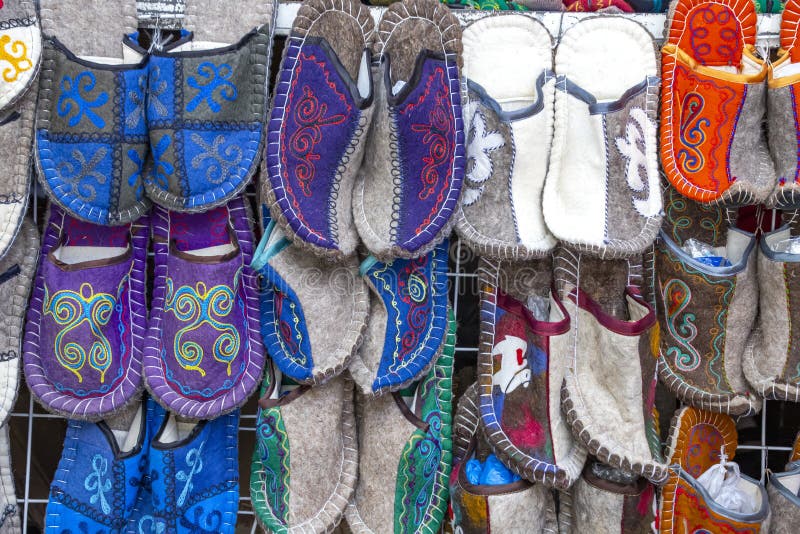 Handmade oriental slippers made of felt with a national ornament. Market. Travel. Kyrgyzstan