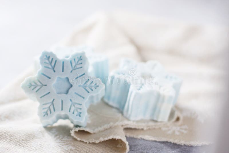Handmade soap in the form of snowflakes, natural cosmetics concept. Place for text. Selective focus. Soap snowflake stock images, royalty-free photos and pictures