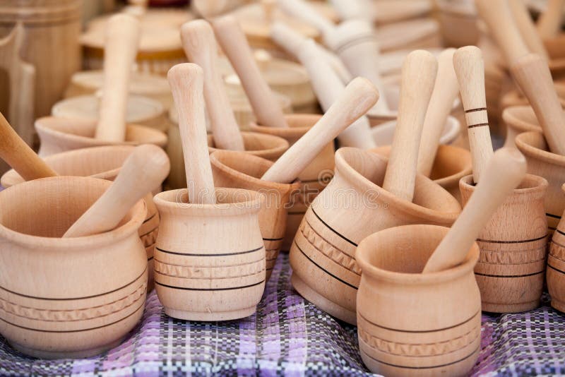 Handmade wooden pounder, pestle handicraft market