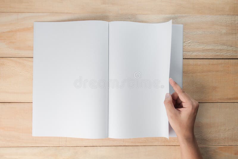 Handoffenes leeres Buch oder -zeitschriften stockfoto Handoffenes leeres Buch oder -zeitschriften stockfoto