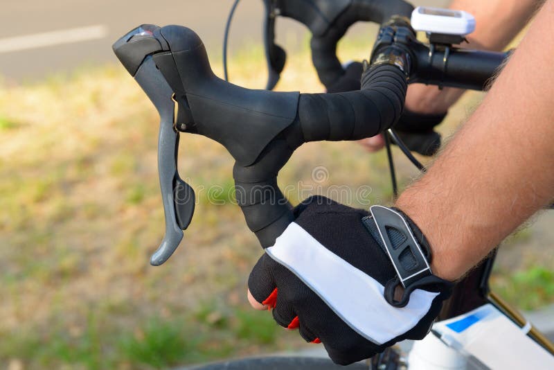 Hands on bicycle s handlebars