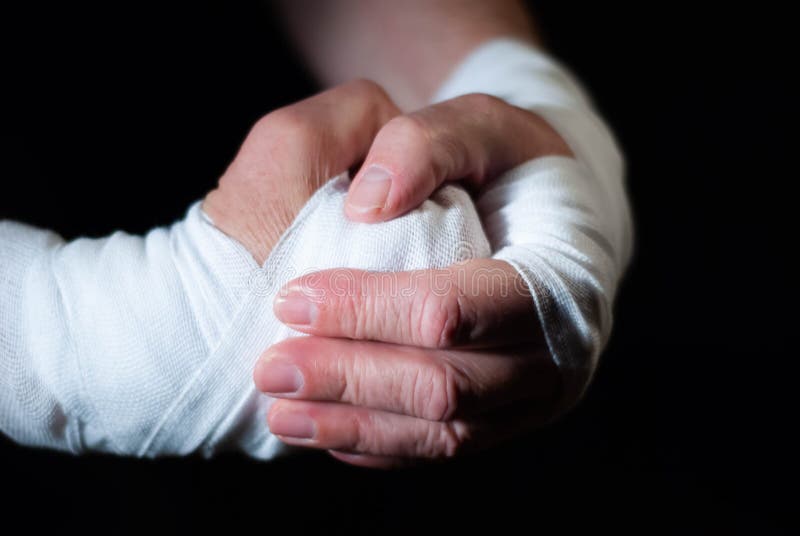 Hands of a Boxer with White Bandages Prepared To Fight in a Sport ...