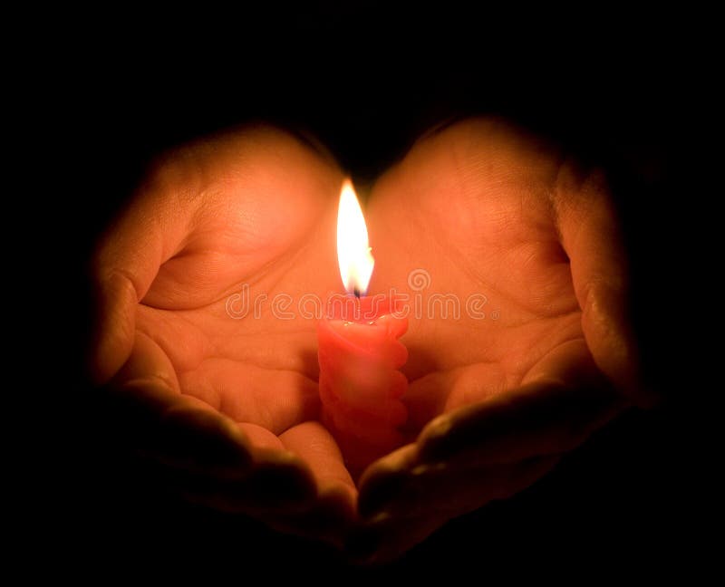Hands and a burning candle stock image. Image of candle 12694989