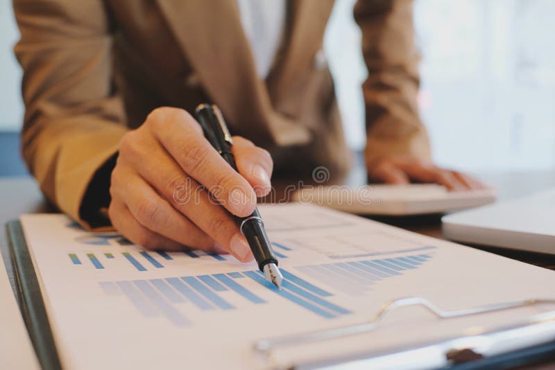 Hands of business people analyzing chart Finance managers task royalty free stock image