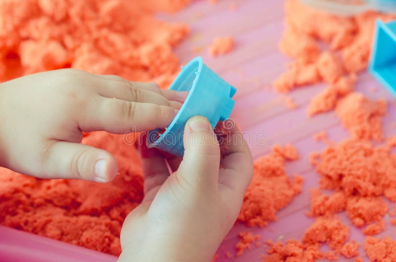 The Hands of a Child Playing with Sand Stock Image Image of