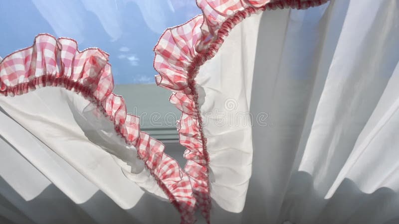 Hands close white curtains with frills low angle shot