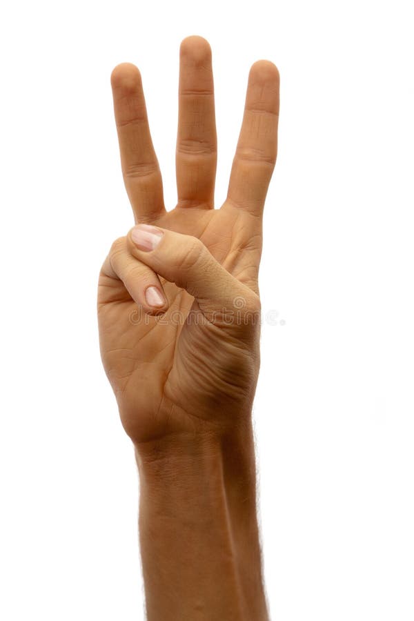 The hand of man shows three fingers on white background. The hand of man shows three fingers on white background