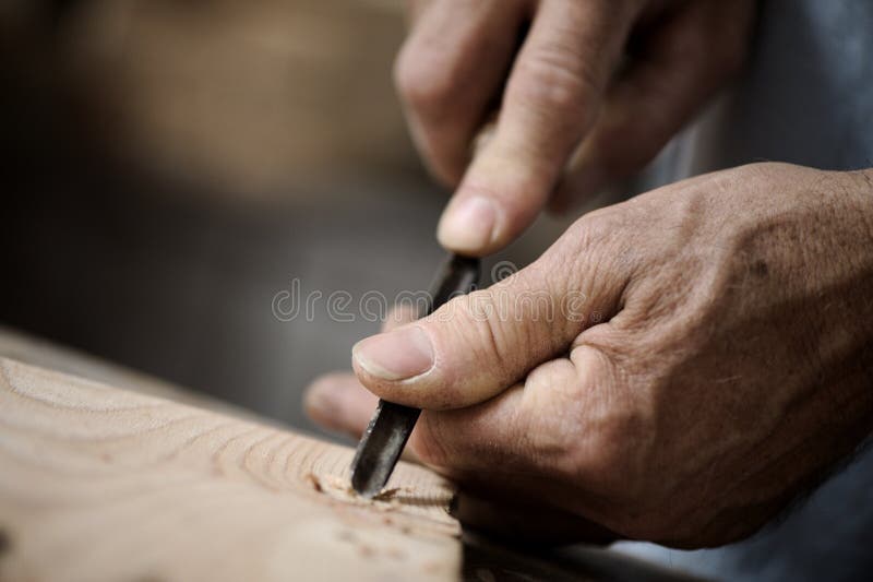 Hands of a craftsman stock photo