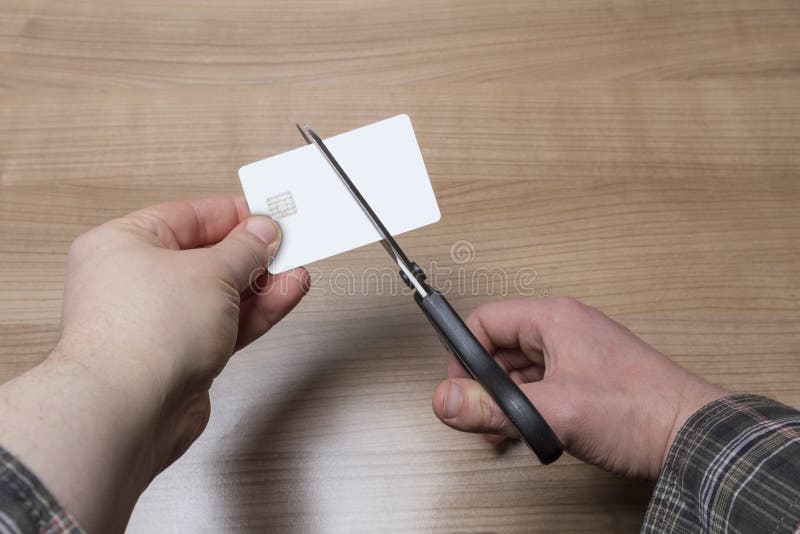 Hands Cutting a Credit or Debit Card Stock Photo Image of shop, money