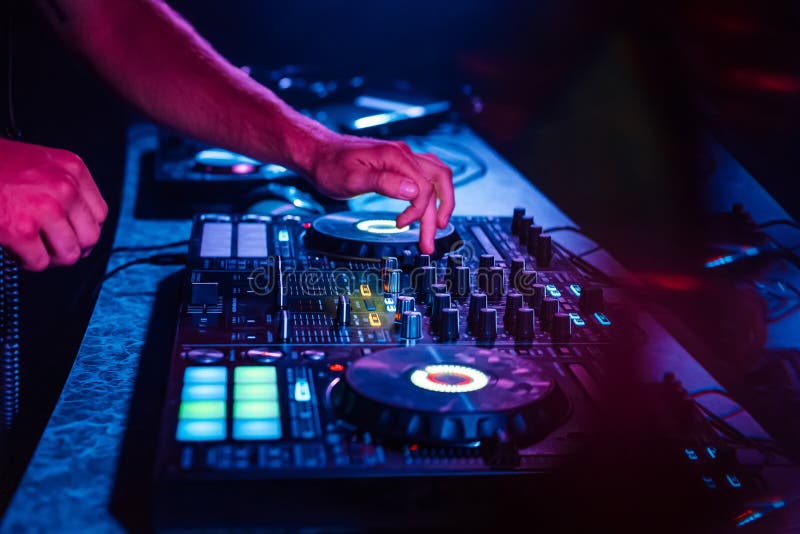 Hands of a DJ Mixing Music on a Professional Controller in a Booth Stock Image Image of