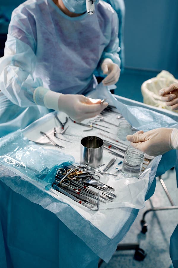 Hands of Doctors Teamwork, Surgeons Transfer Instruments during Surgery