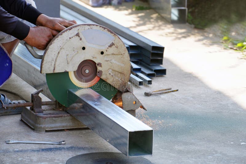 Hands Doing Electric Saws Cutting Steel Stock Photo Image of