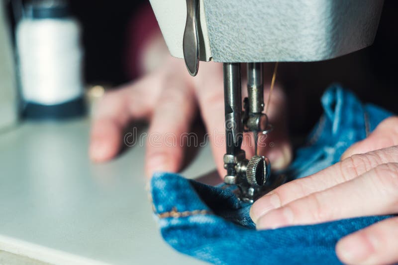 The Elderly Seamstress is Working on Sewing Machine Stock Image Image