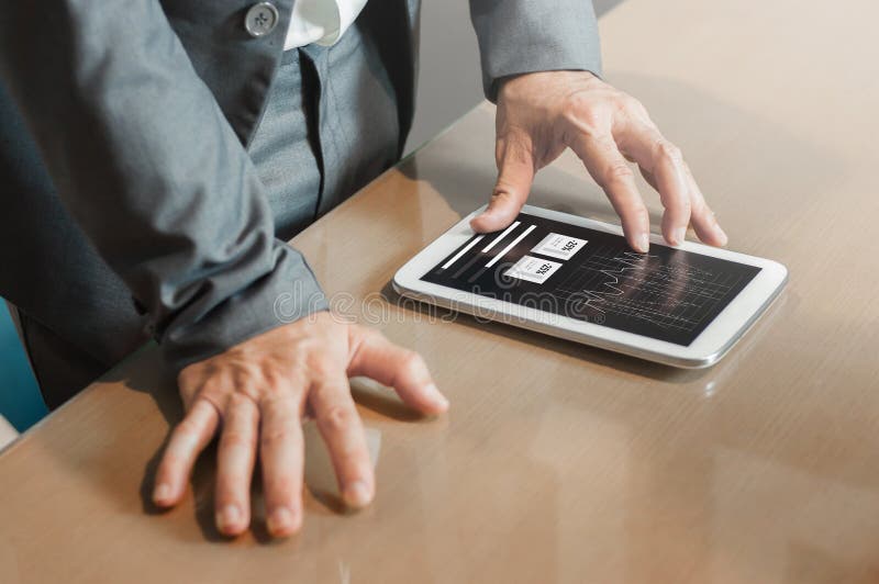 Hands of financial manager on tablet. Businessman planning strategy his work. stock image Hands of financial manager on tablet. Businessman planning strategy his work. stock image