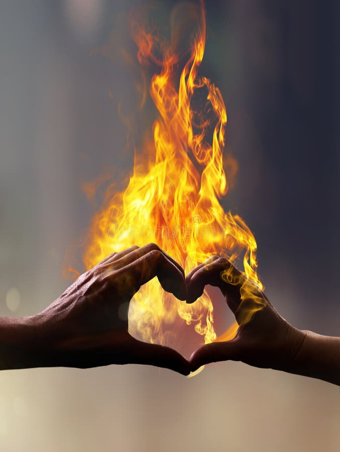 Hands with fire in form of heart