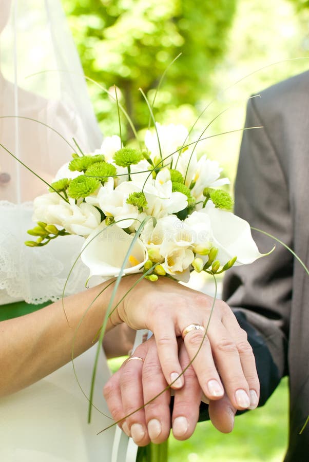 Hands and flower bouquet stock photography Hands and flower bouquet stock photography