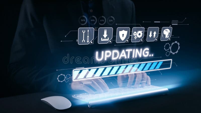 Hands on a futuristic keyboard with holographic interface showing loading progress bar and updating message in a dark stock photography