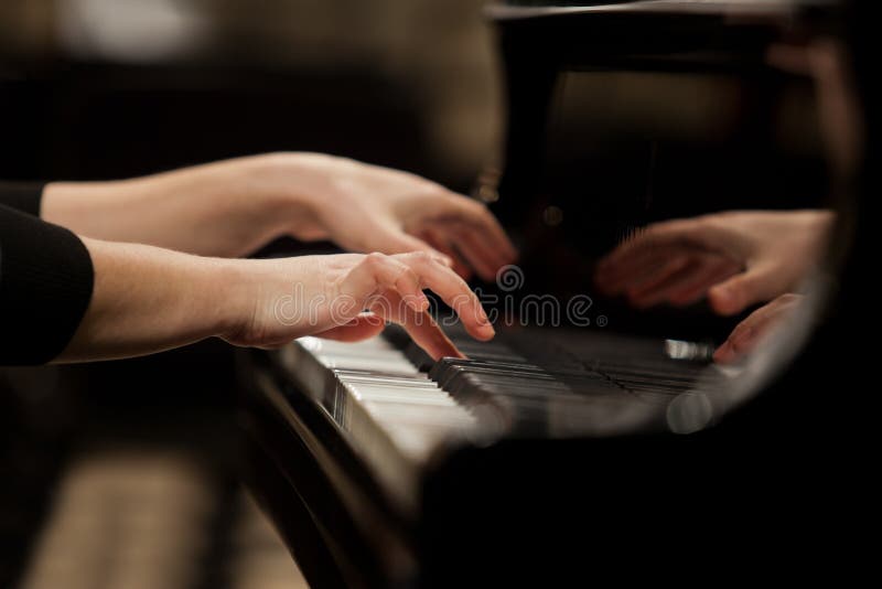 Hands girl playing piano royalty free stock photo