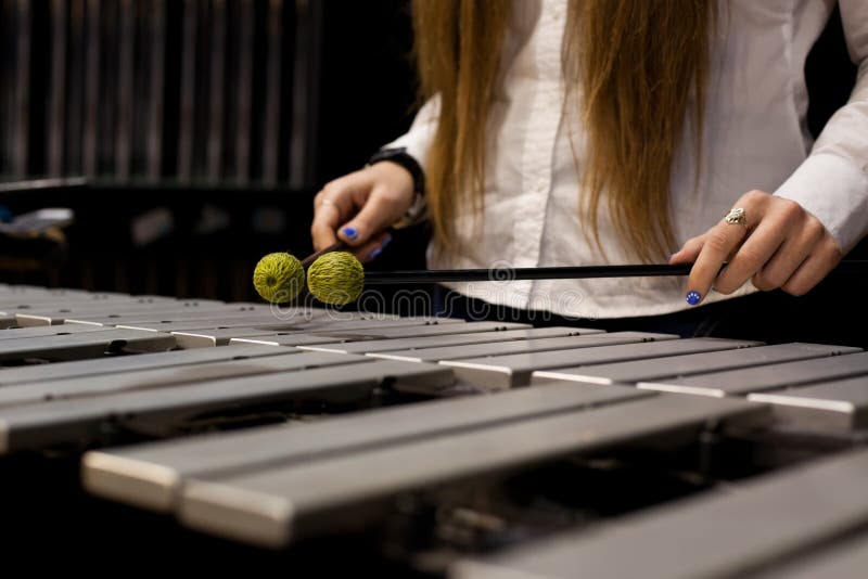 Hands girl playing the vibraphone royalty free stock images